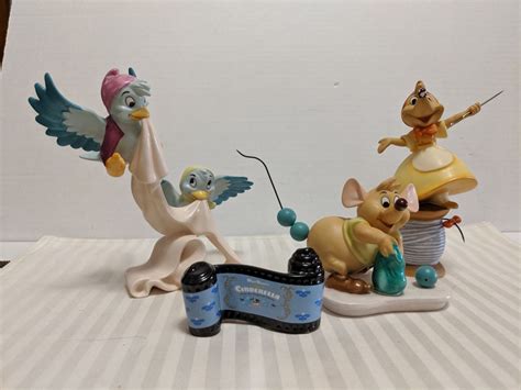 From Department 56&39;s "Disney Village" series. . Walt disney classic collection ceramic figurines